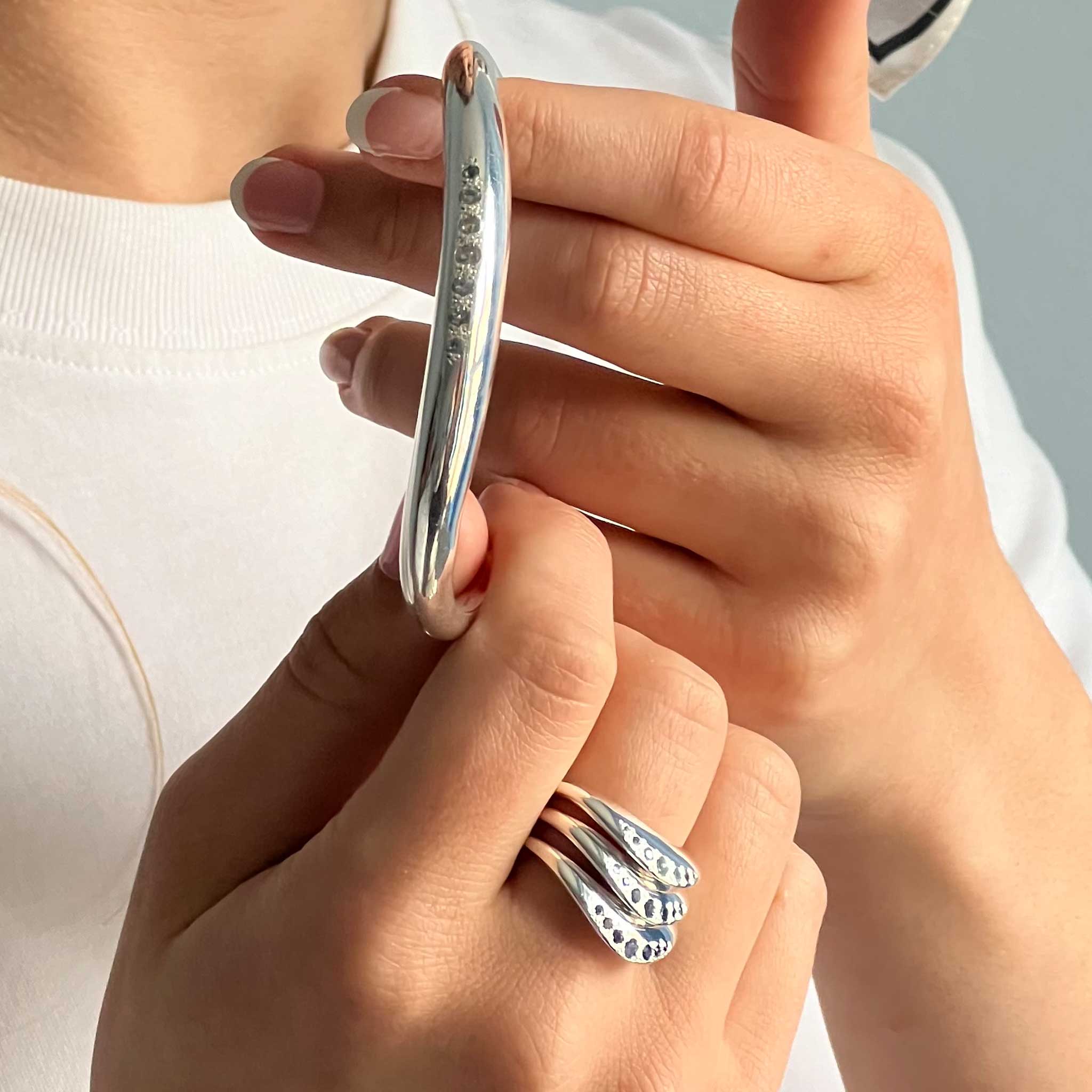 Brilliant-Cut Aquamarine and Silver Wave Bangle